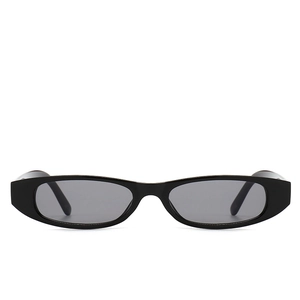Retro small oval sunglasses in minimalist black frame design for vintage fashion style