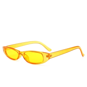 Retro small oval sunglasses with translucent bright yellow resin frame and tinted lenses