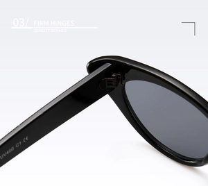Detail of sturdy metal hinges and UV400 CE marking on cat eye sunglasses temples