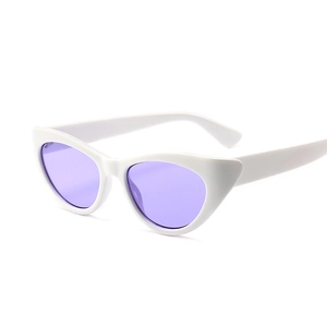 Retro cat eye sunglasses with white polished frames and vibrant purple lenses