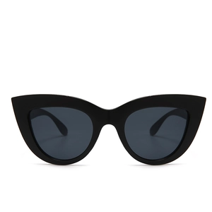 Retro black cat eye sunglasses with wide frames and dark UV protection lenses