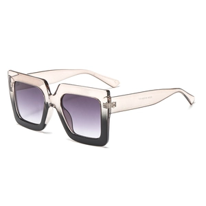 Stylish square oversized sunglasses with gradient tea frames and purple lenses on white background