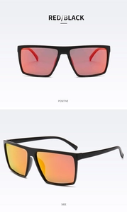 Close-up of polarized square sunglasses with red mirror lenses and black plastic frame