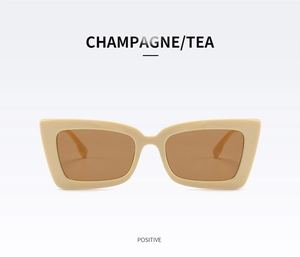 Front view of champagne square frame sunglasses with tea lenses and retro design