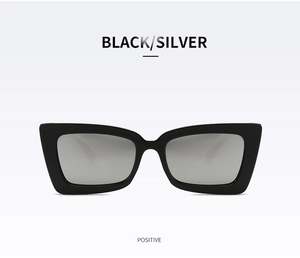 Front view of trendy oversized square sunglasses in black with silver mirrored lenses