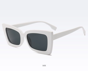 Side view of trendy white oversized square sunglasses with dark tinted lenses