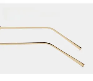 Close-up of golden curved metal temples for enhanced comfort and non-slip eyewear grip