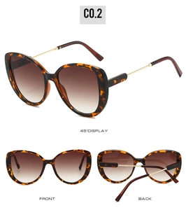 Three-way view of tortoiseshell cat-eye sunglasses with gold metal temples and gradient lenses