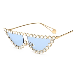 Lunettes de soleil œil de chat de luxe avec strass et monture dorée aux verres bleu clair