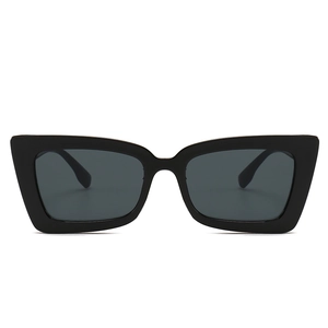 Fashionable oversized square black sunglasses with dark gray lenses for a retro chic look