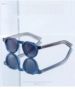 Detailed macro view of retro round blue acetate frame with metal core and rivets