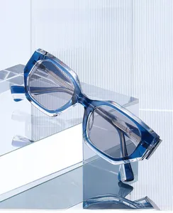Detailed view of dark blue geometric sunglasses frames with CE marking on glass display