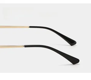 Detail view of golden metal temples with black anti-slip curved tips for comfort