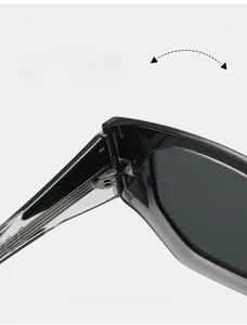 Detail of durable reinforced metal hinge and CE mark on black rectangle sunglasses