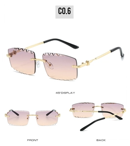 Detail view of rimless rectangular sunglasses with gradient lenses and gold metal temples