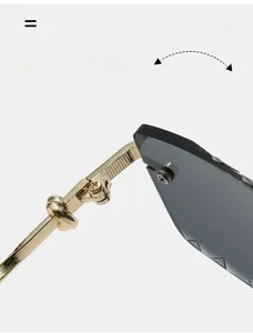 Detail of durable gold metal hinge with twisted design on rimless square sunglasses