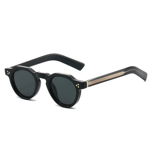 Retro round thick-frame sunglasses with gold rivets and black geometric acetate frames