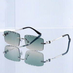 Fashion rimless square sunglasses with teal gradient diamond cut lenses and silver frame