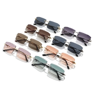 Fashionable rimless square metal sunglasses with diamond-cut lenses in multiple colors