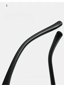 Detail of curved black mirror legs on cat eye sunglasses for comfortable ergonomic wear