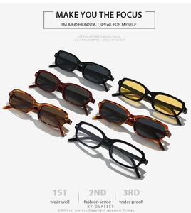 Close-up of stylish rectangle sunglasses showing assorted colors and rivet details