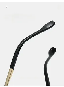 Detail of ergonomic black and gold metal curved temple for comfortable eyewear fit