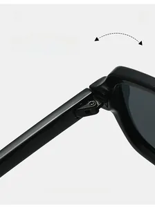 Macro detail of a durable metal hinge on stylish black square frame sunglasses