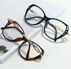 Detail of butterfly metal twisted temples on black and tortoiseshell square glasses