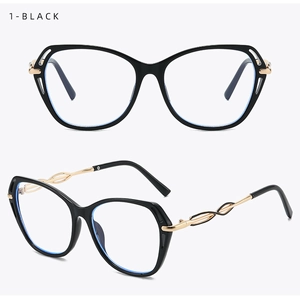 Detail of butterfly cat-eye frames with golden twisted metal temples and hollow design