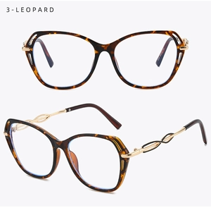 Detail of leopard acetate cat-eye glasses with gold twisted metal hollow temples
