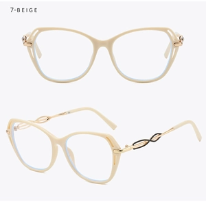 Detail of beige cat eye glasses featuring twisted gold and black metal temple design