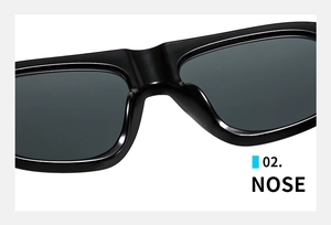 Close-up detail of the smooth nose pads and polished black bridge on the fashion sunglasses