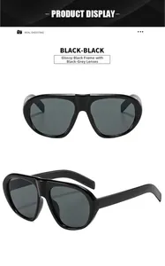 Glossy black oversized sunglasses with gray lenses in flat lay front and side views