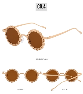 Vue triple des lunettes de soleil fleurs avec verres marrons et monture dorée mate fine