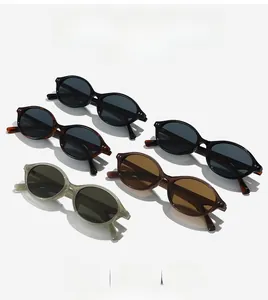 Five assorted vintage oval sunglasses in black, tortoiseshell, brown, green and grey