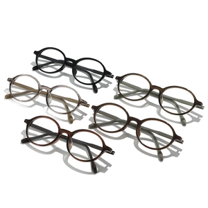 Retro round TR90 anti-blue light glasses shown in various colors like black and amber