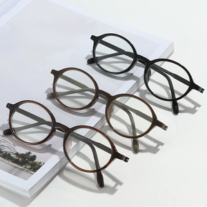 Classic round retro TR90 frame glasses in black, brown, and tortoiseshell colors