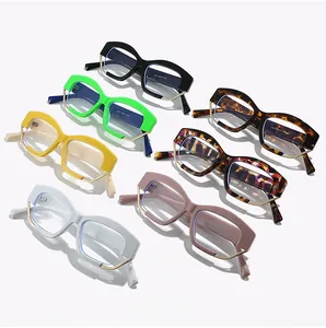 Overhead view of colorful oversized irregular frame glasses with metallic nose bridge
