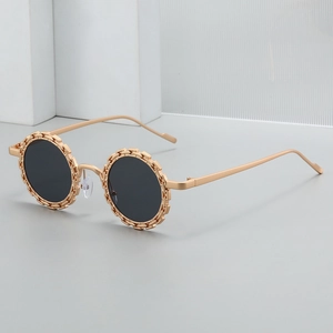 Lunettes de soleil rétro rondes pour femmes avec monture dorée et verres foncés