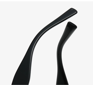 Detail of glossy black eyewear temples featuring ergonomic curved tips and premium finish