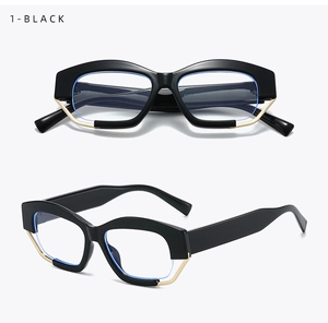 Detailed macro shot of irregular thick black frames with golden metal inlay accents