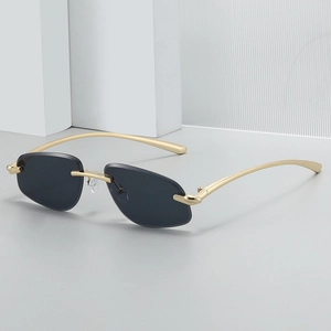 Modern rimless polygon sunglasses with gold metal temples on a minimalist geometric base