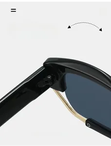 Macro shot of durable golden metal hinges on stylish oversized polygon sunglasses