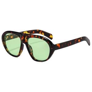 Retro oversized tortoiseshell aviator sunglasses with stylish light green tinted lenses