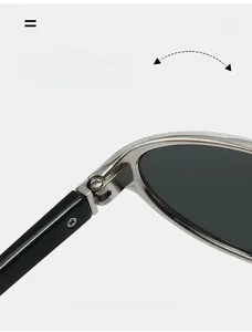 Détail de la charnière robuste sur lunettes de soleil œil-de-chat argentées à monture ovale