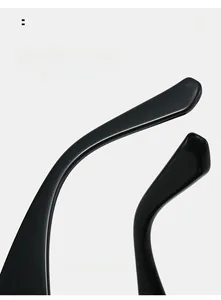 Detail of black glossy curved sunglasses legs for comfortable wear and stylish fit