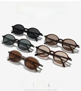 Multiple retro TR90 round frame sunglasses in black, grey, brown and tea colors