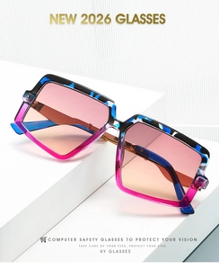 Close-up of square sunglasses with tricolor blue black pink frame and gradient lenses