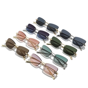 Lunettes de soleil œil-de-chat sans monture en 8 couleurs avec branches dorées fines