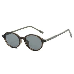 Retro TR90 round sunglasses with translucent grey frames and dark grey lenses for women